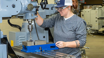 Photo of student using a milling machine