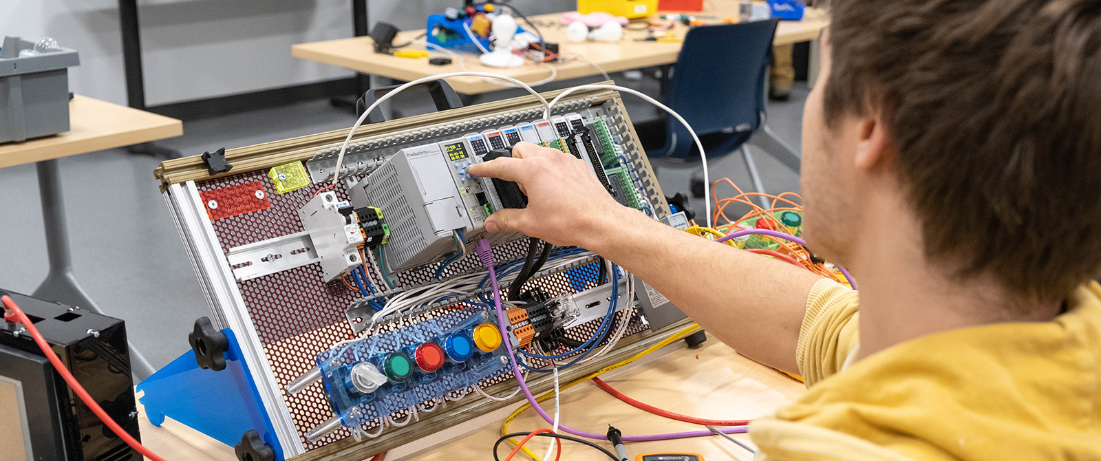 Student working a lab on the iREAL trainer