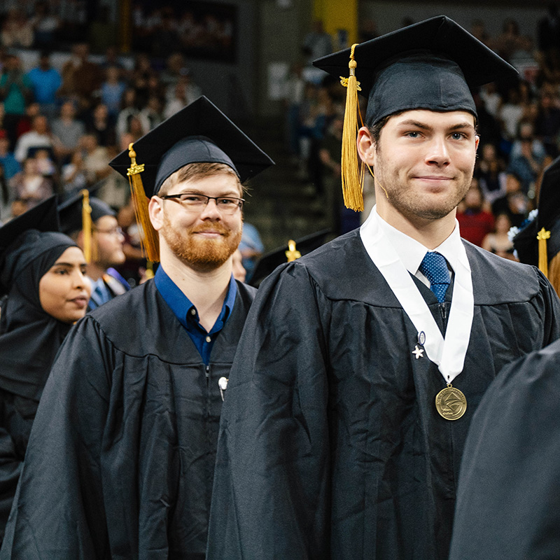 SCC graduates celebrating at commencement