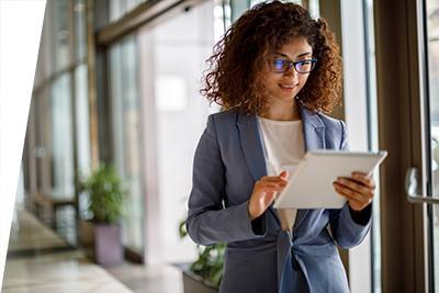 Business woman using electronic tablet