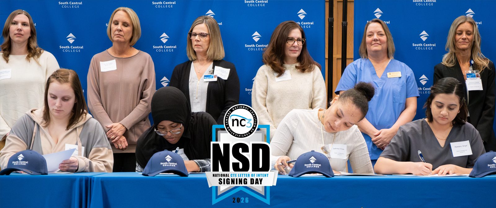 Students signing National Coalition of Certification Centers letters at SCC's 2026 Signing Day.