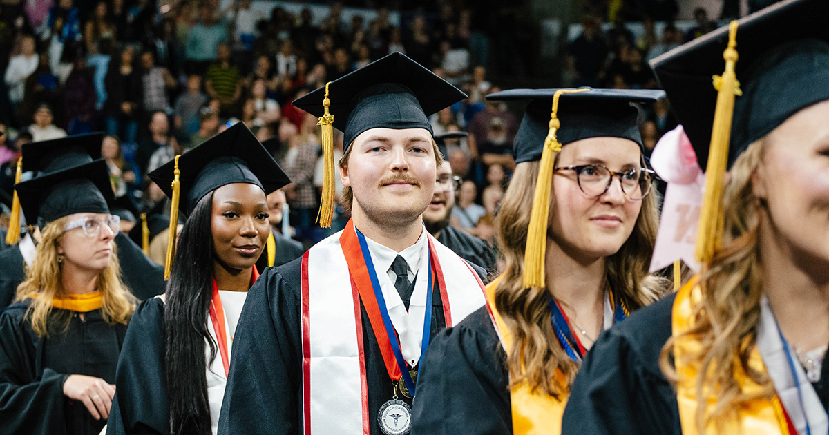 Graduates walking down the isle at 2026 Commencement Ceremony.
