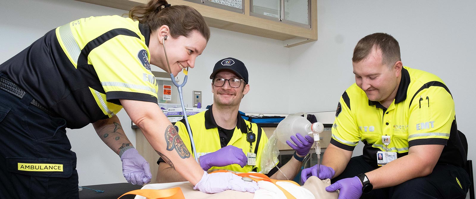 Group of students practicing on a patient simulator